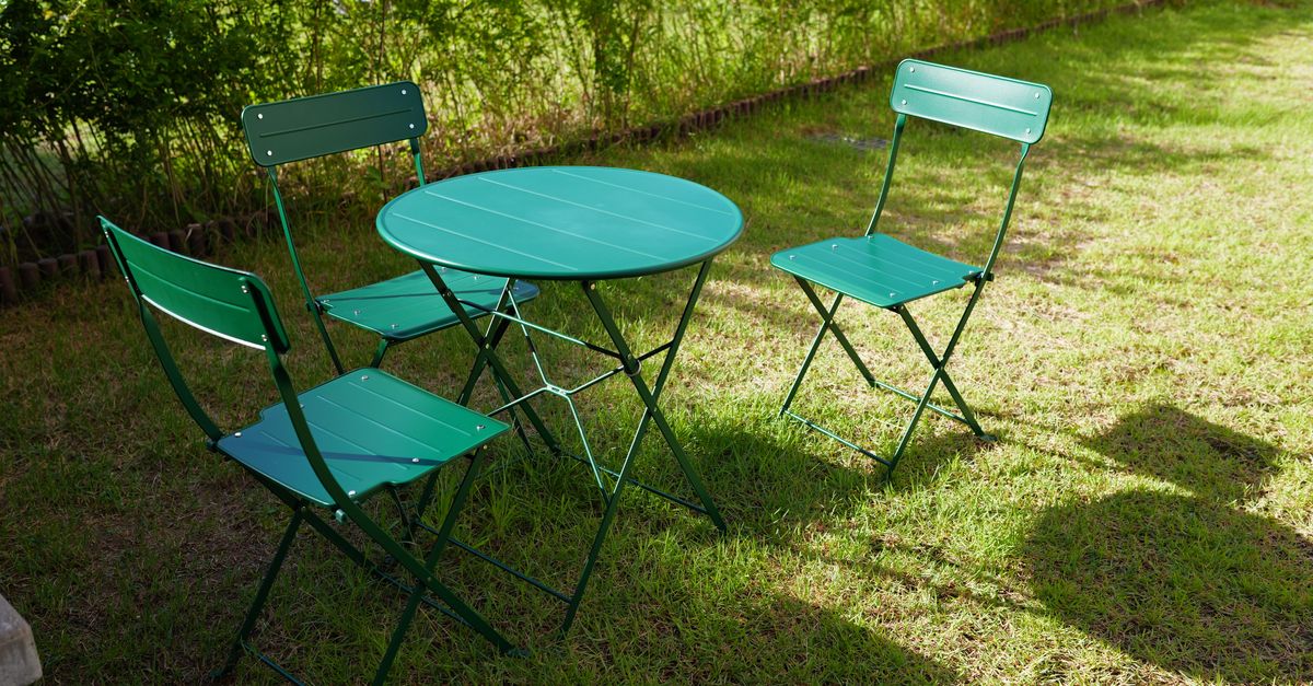 Garden bistro seating with lush green surroundings